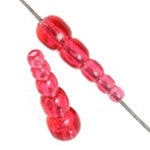 STACKED BEADS TRANSPARENT RASPBERRY ACRYLIC